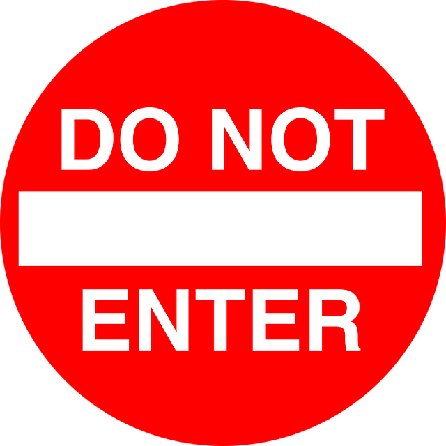 Classic red & white sign reading "DO NOT ENTER"